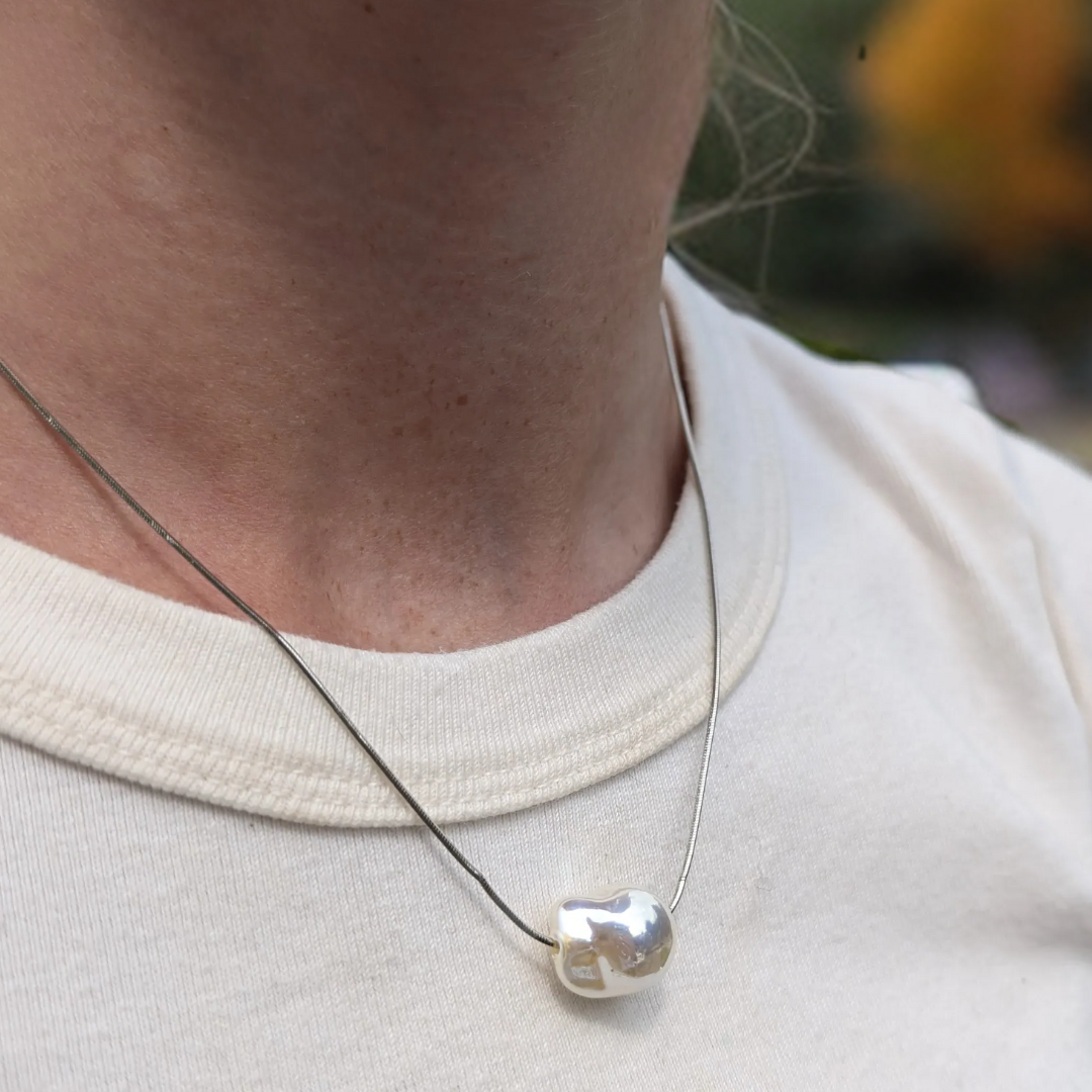 Fijne zilveren ketting met grote zoet water parel