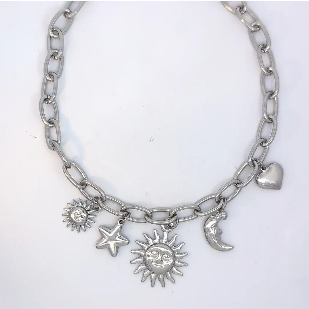 Setje zilveren schakel ketting en armband met 5 bedels zon maan ster en hartje - Casa Jadel