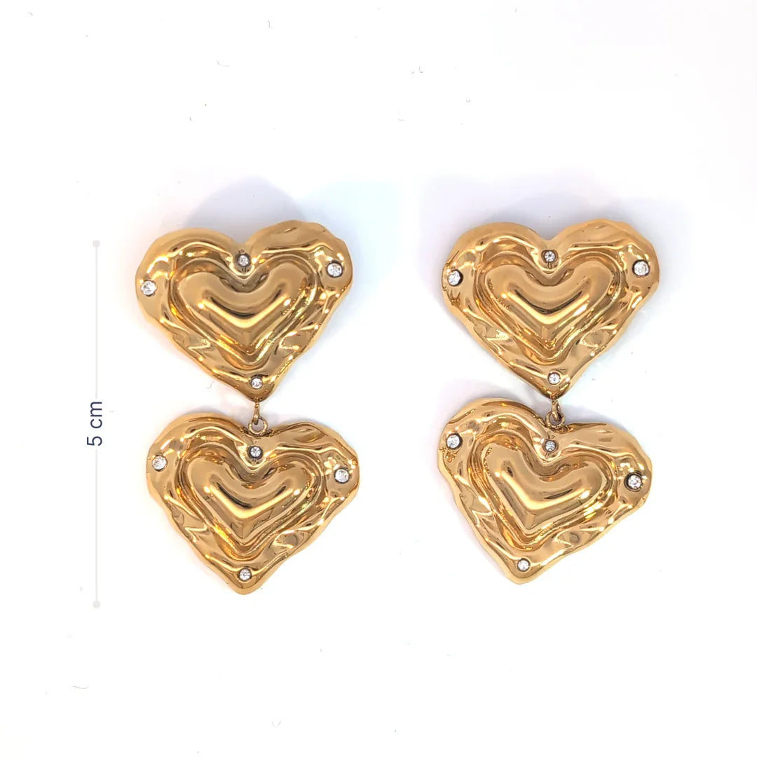 Gouden oorknopjes met dubbel holle hartjes met strass - Casa Jadel