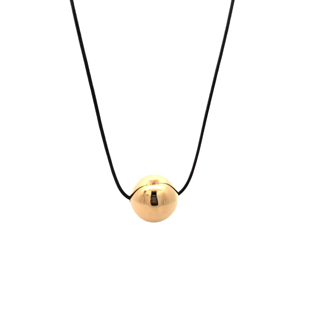Zwart koord ketting met grote gouden bal - Casa Jadel