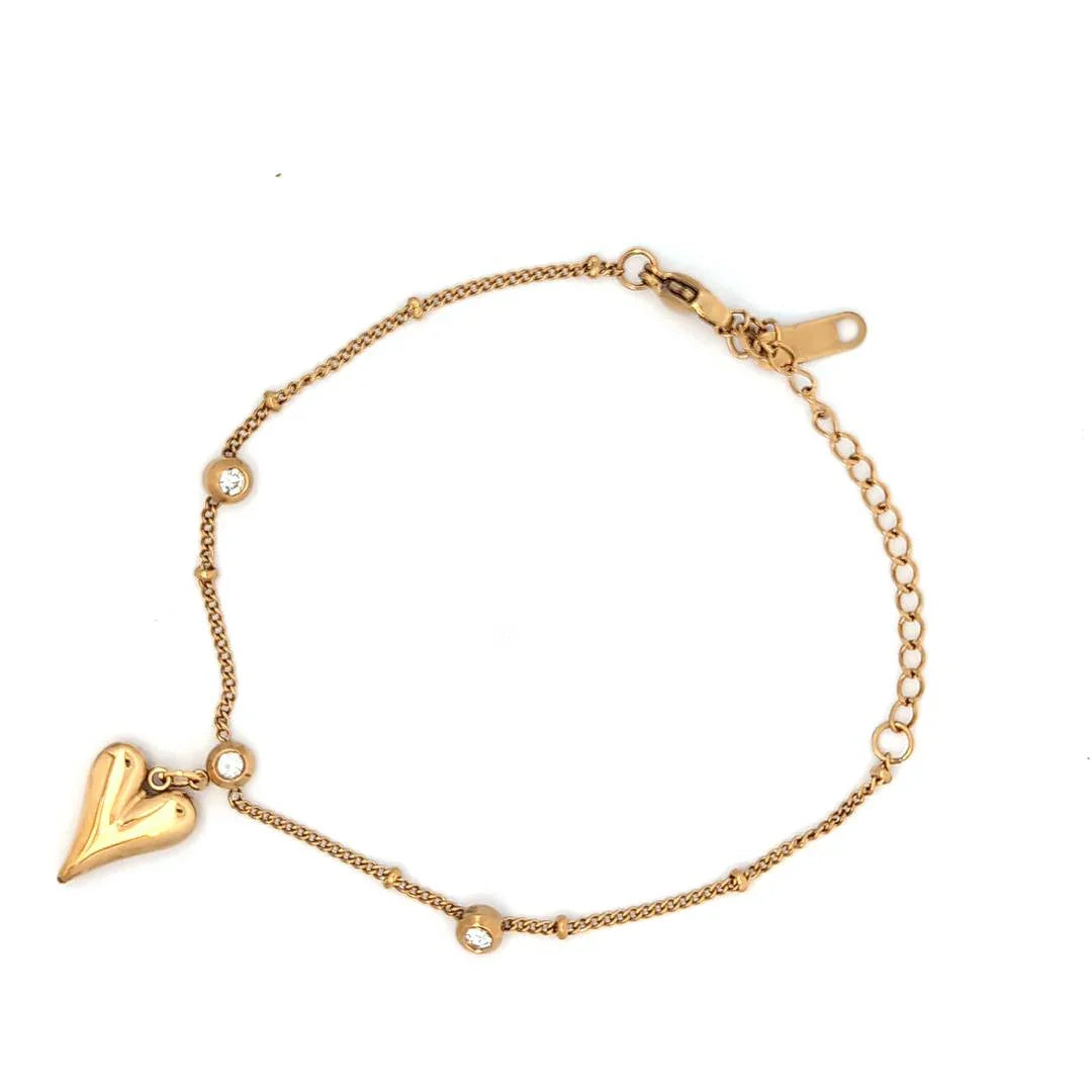 Gouden armband met 3 kristallen en een gouden bedel hart - Casa Jadel