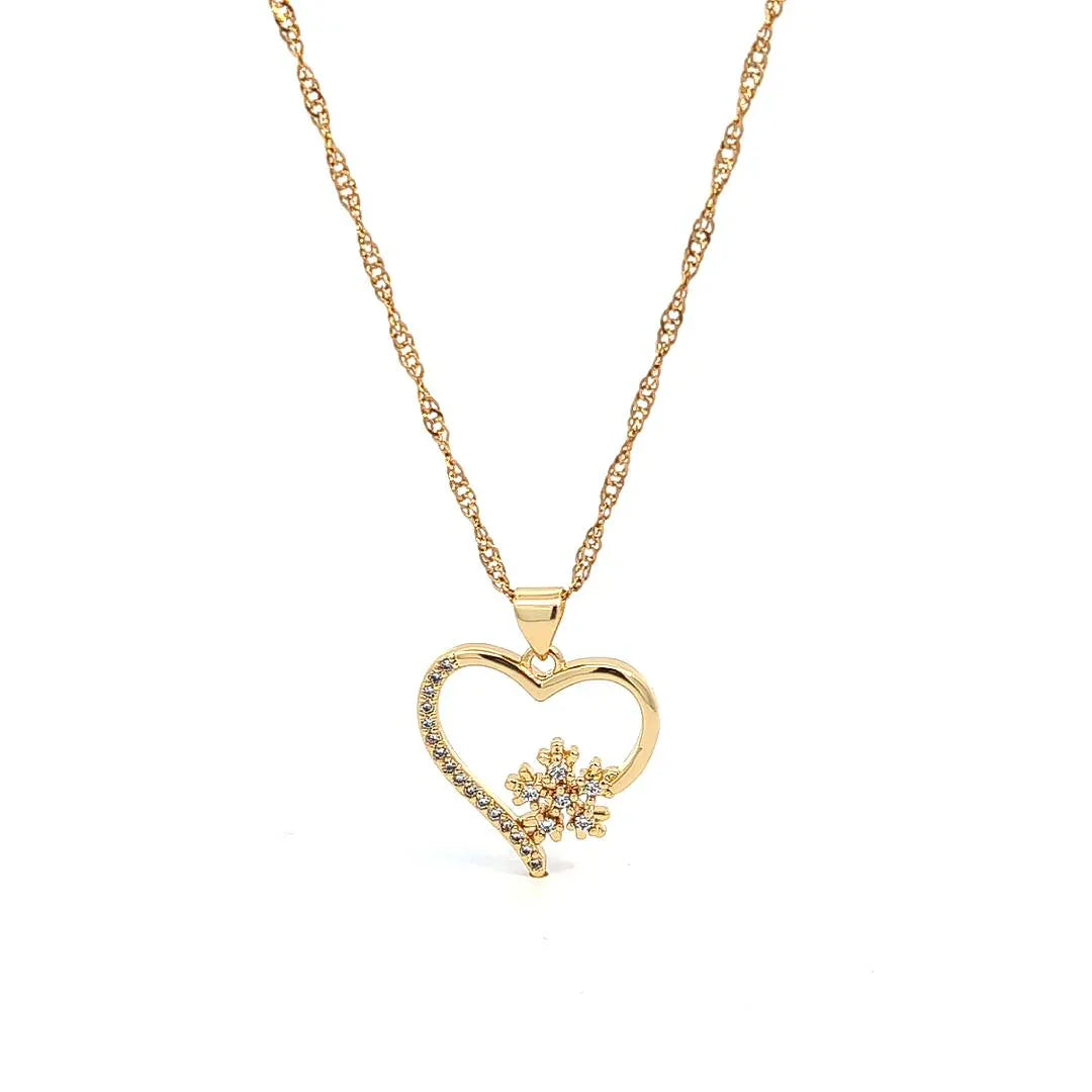 Ketting goud met een bedel hartje en ijskristal gedeeltelijk afgezet met strass - Casa Jadel