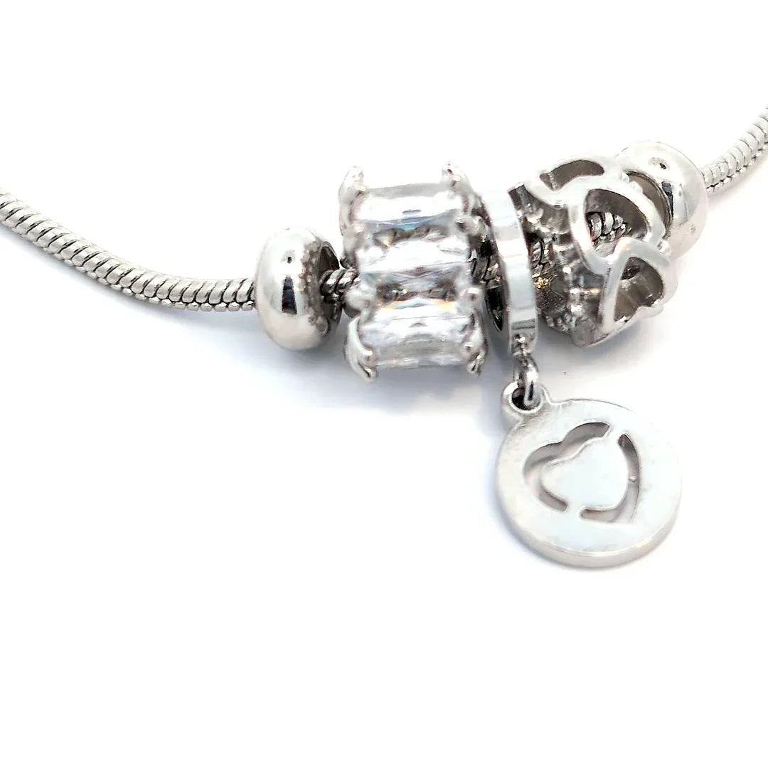 Verstelbare zilveren armband met 3 bedeltjes - Casa Jadel