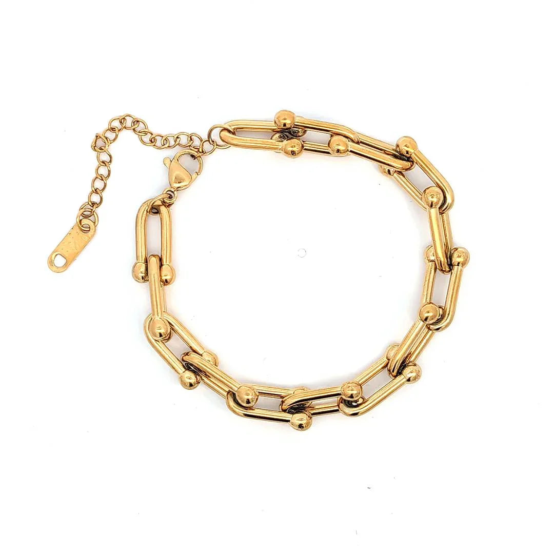 Schakel gouden armband met harpen - Casa Jadel