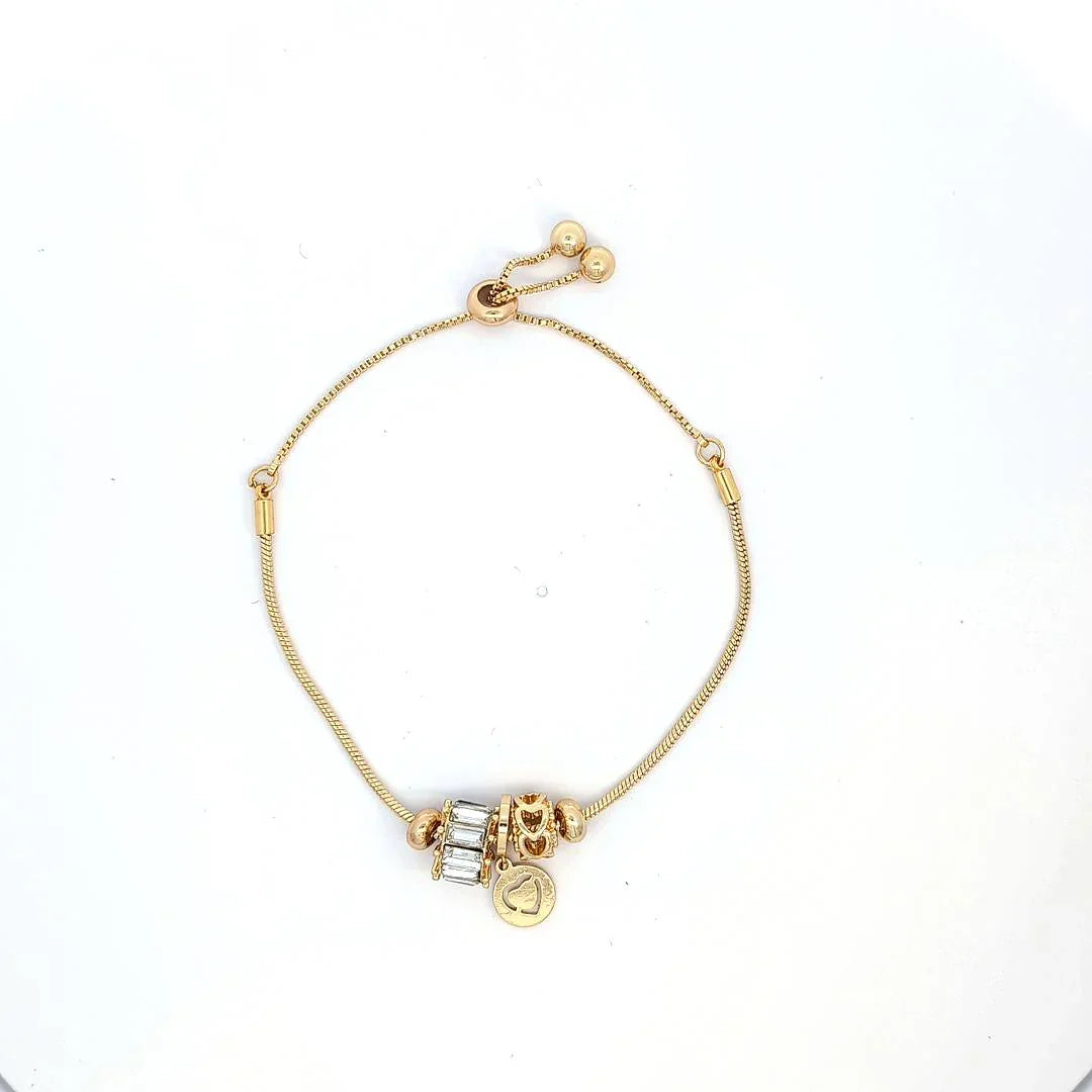 Verstelbare gouden armband met 3 bedeltjes - Casa Jadel