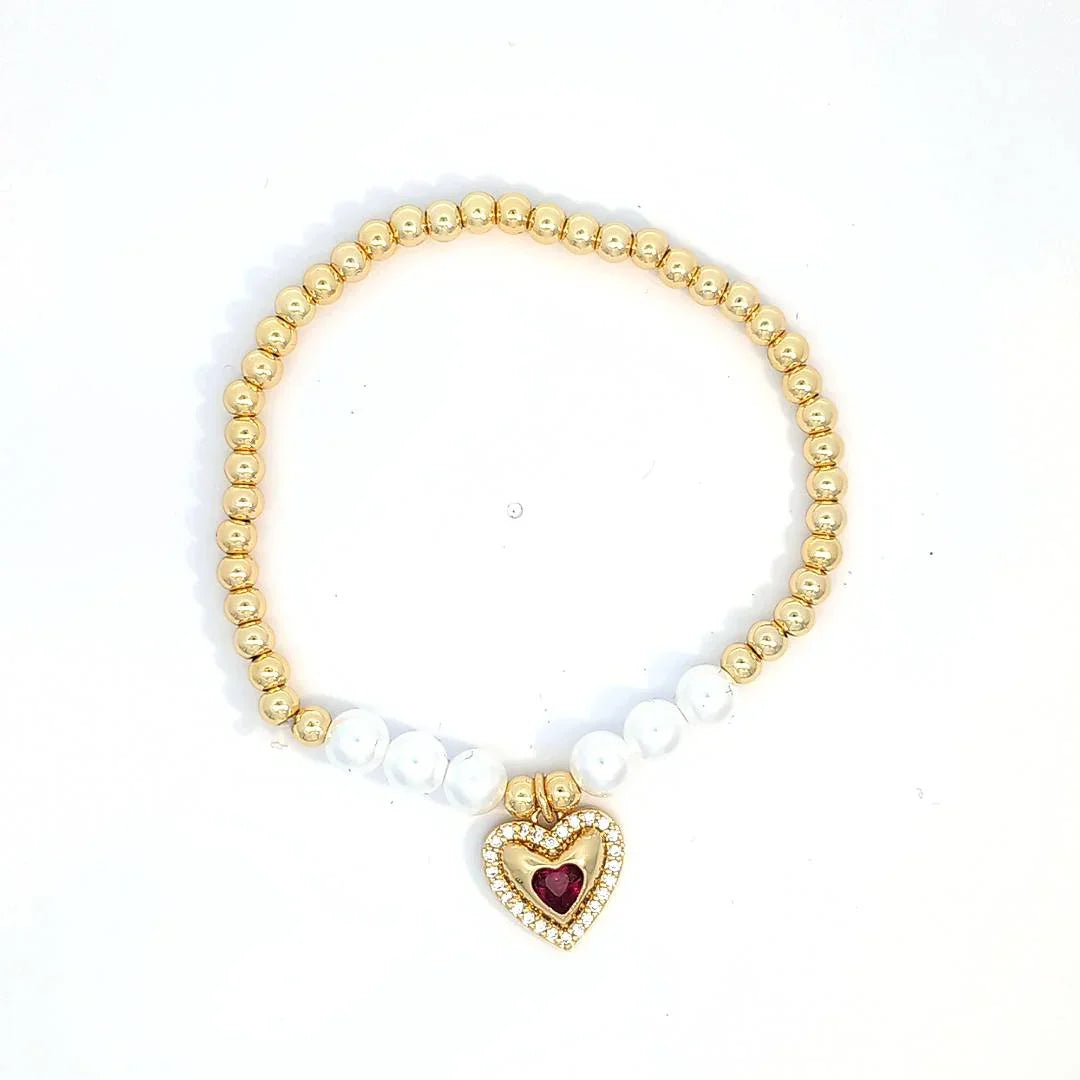 Gouden kralen armband met imitatie parels en een hartje met een rode steen - Casa Jadel