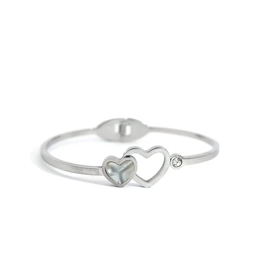 Bangle zilver met twee hartjes en een kristal - Casa Jadel