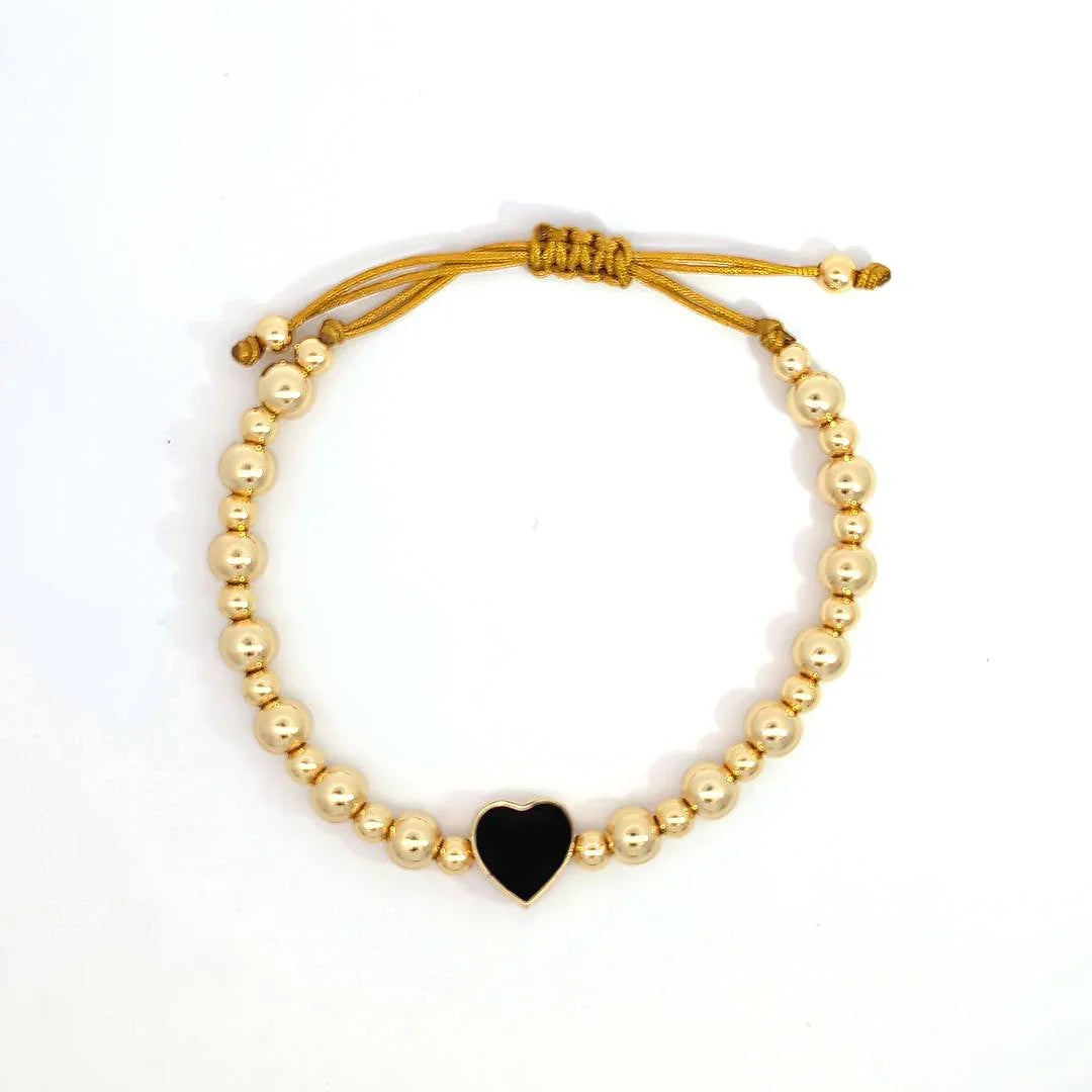 Verstelbare armband met 2 maten kraaltjes en een zwart hartje - Casa Jadel