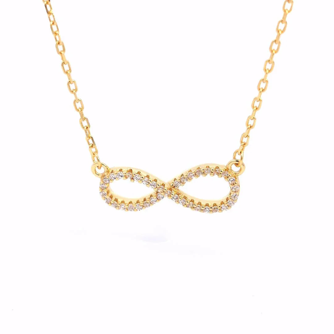 Ketting goudkleurig oneindig hanger afgezet met strass - Casa Jadel