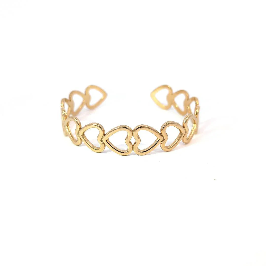 Bangle armband goud met rondom hartjes - Casa Jadel