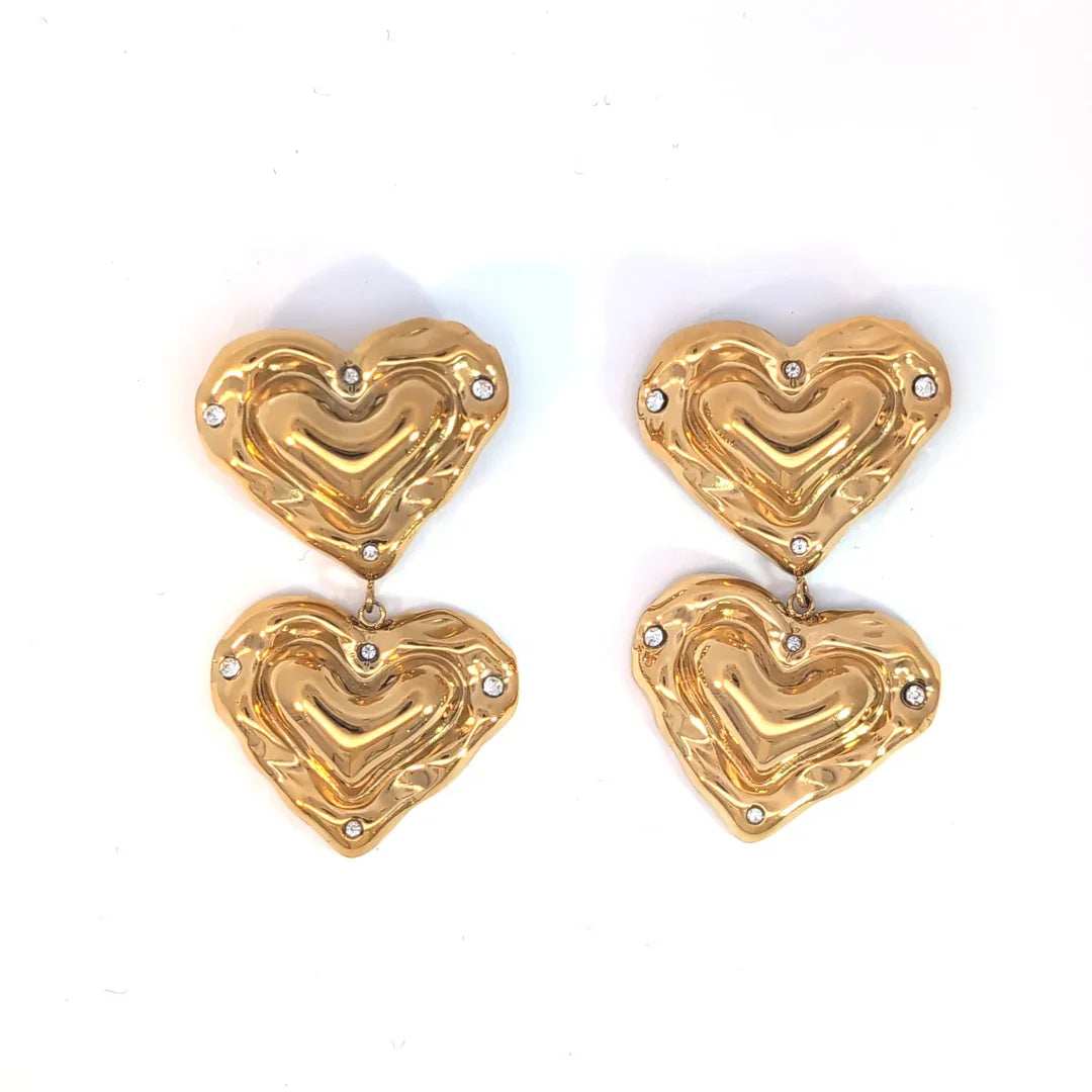 Gouden oorknopjes met dubbel holle hartjes met strass - Casa Jadel