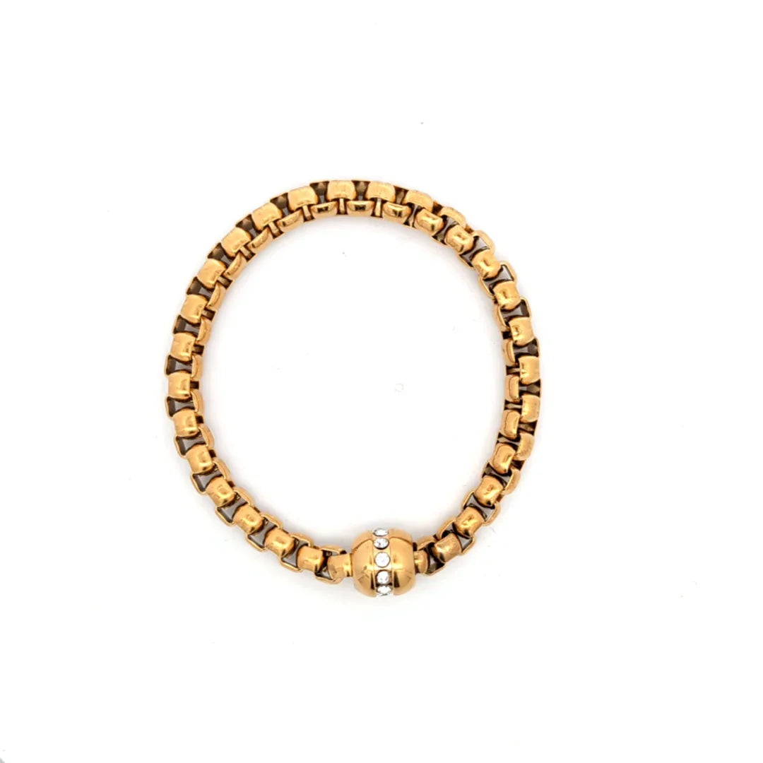 Stevige gouden schakel armband met zirkonen ingelegde bedel - Casa Jadel