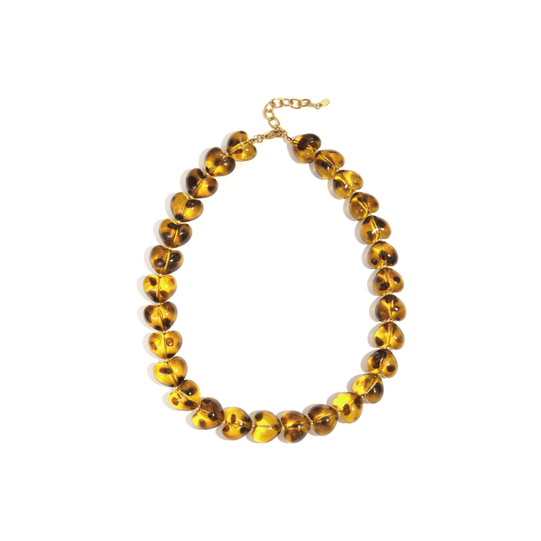 Amber bruin panterprint grote hartjes ketting en gouden kleine hartjes ketting