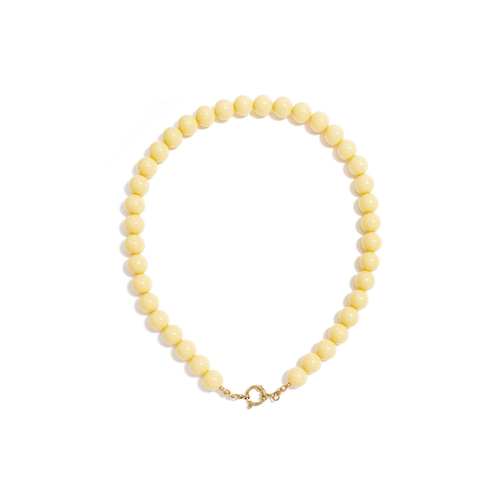 Botergele kralenketting met boeislot