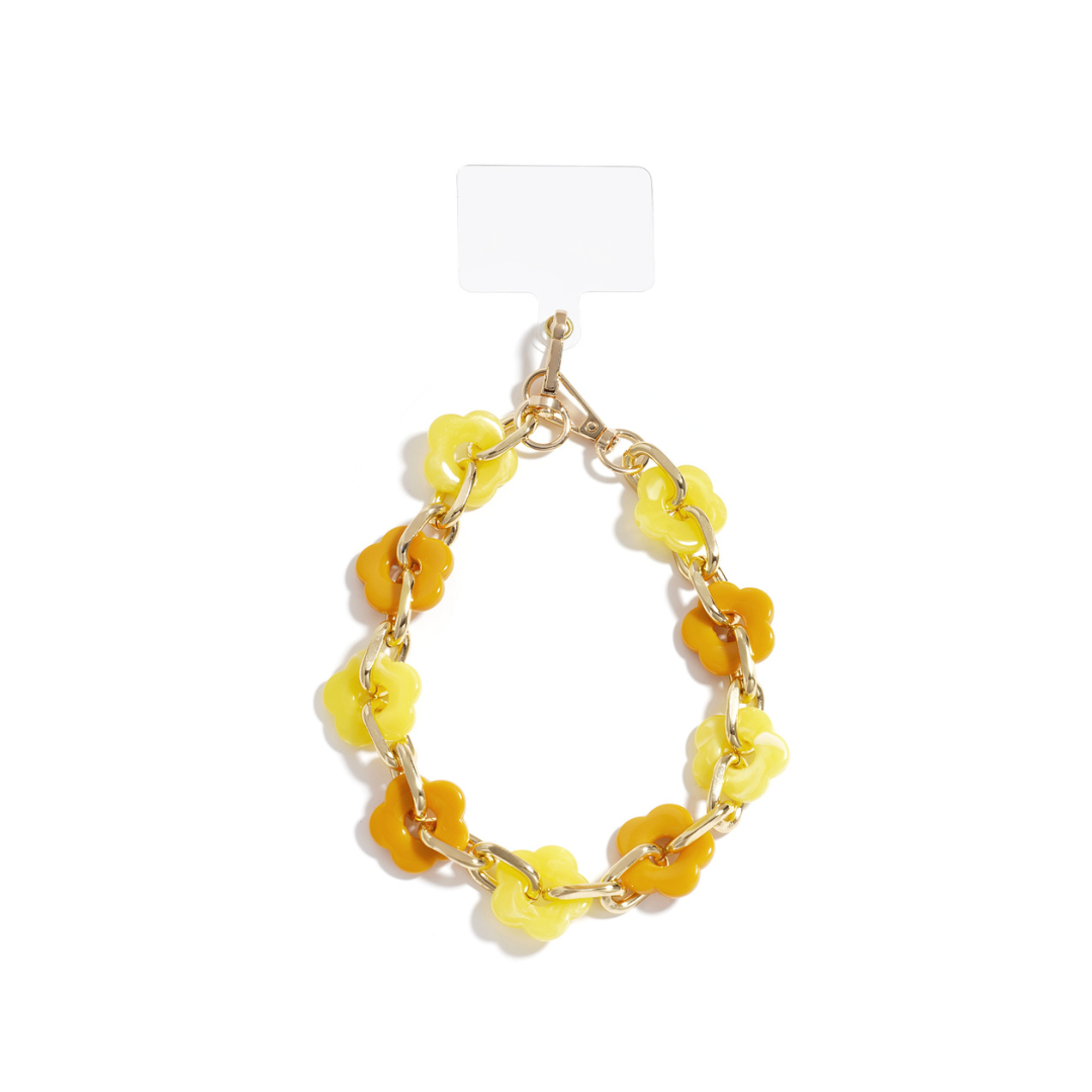 Geel oranje telefoonkoord gemarmerde bloem