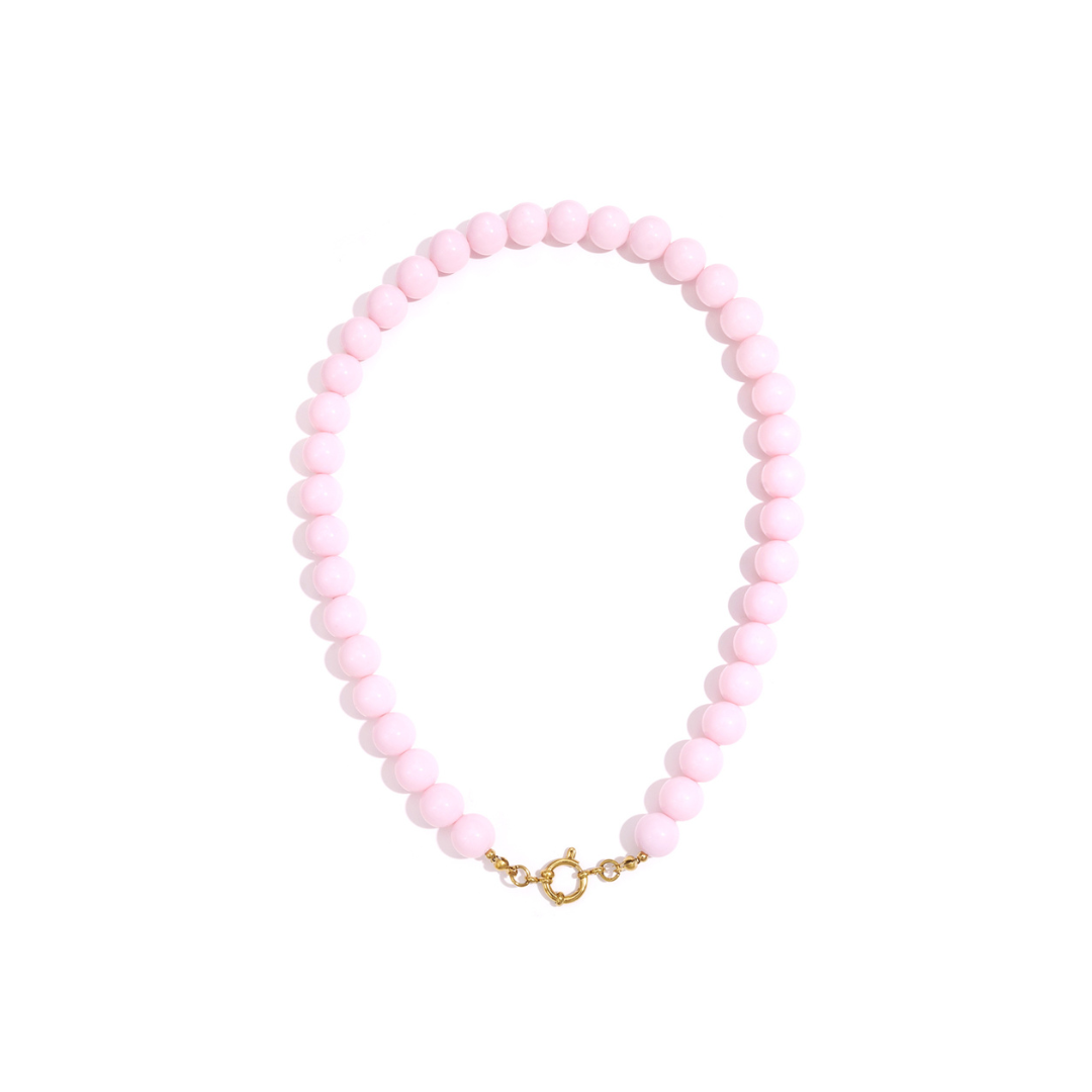 Lichtroze kralenketting met goudkleurig boeislot