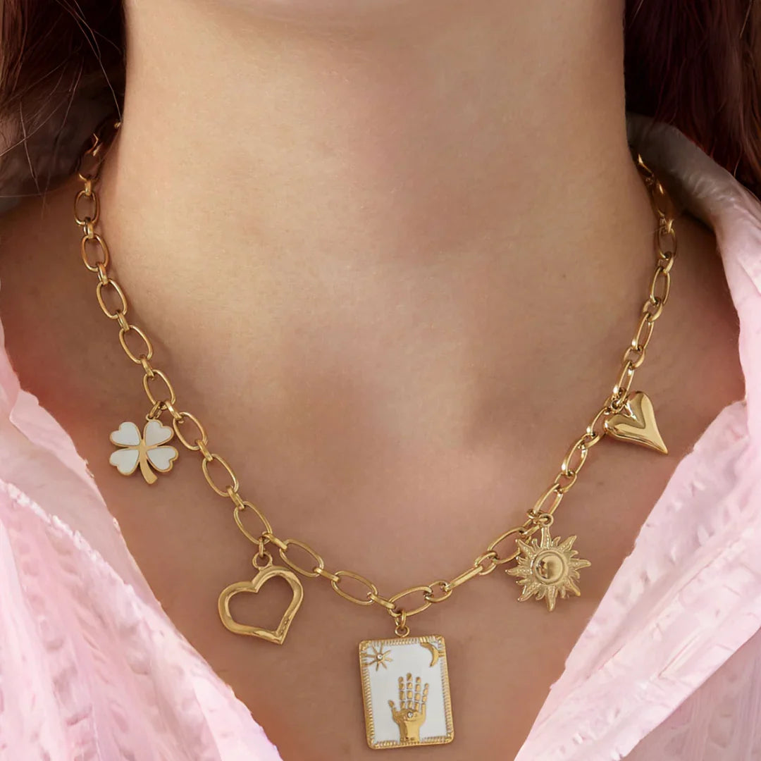 Schakel ketting goud met 5 bedels witte raise your hand in het midden - Casa Jadel