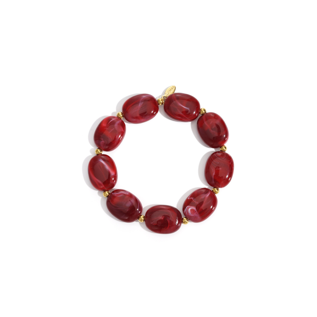 Grote kralen armband gemarmerd donker rood
