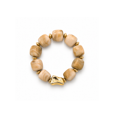 Beige chunky kralenarmband met gouden kraal