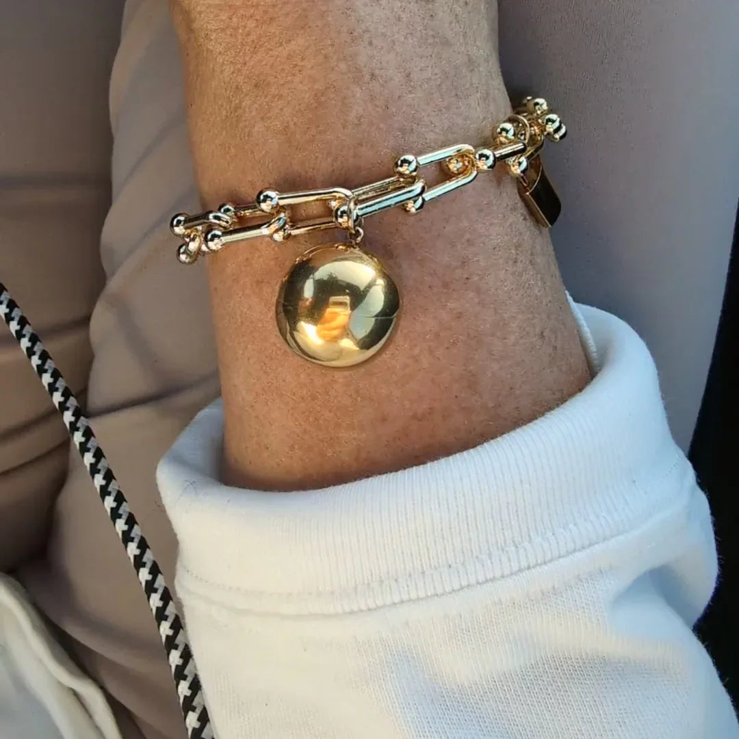 Gouden armband met bal en slotje - Casa Jadel