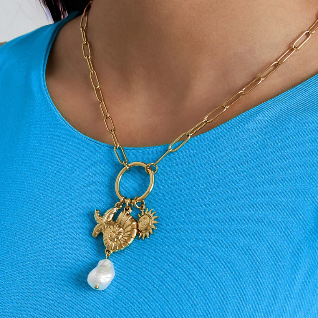Gouden ketting met bedel zon schelp parel zeester - Casa Jadel