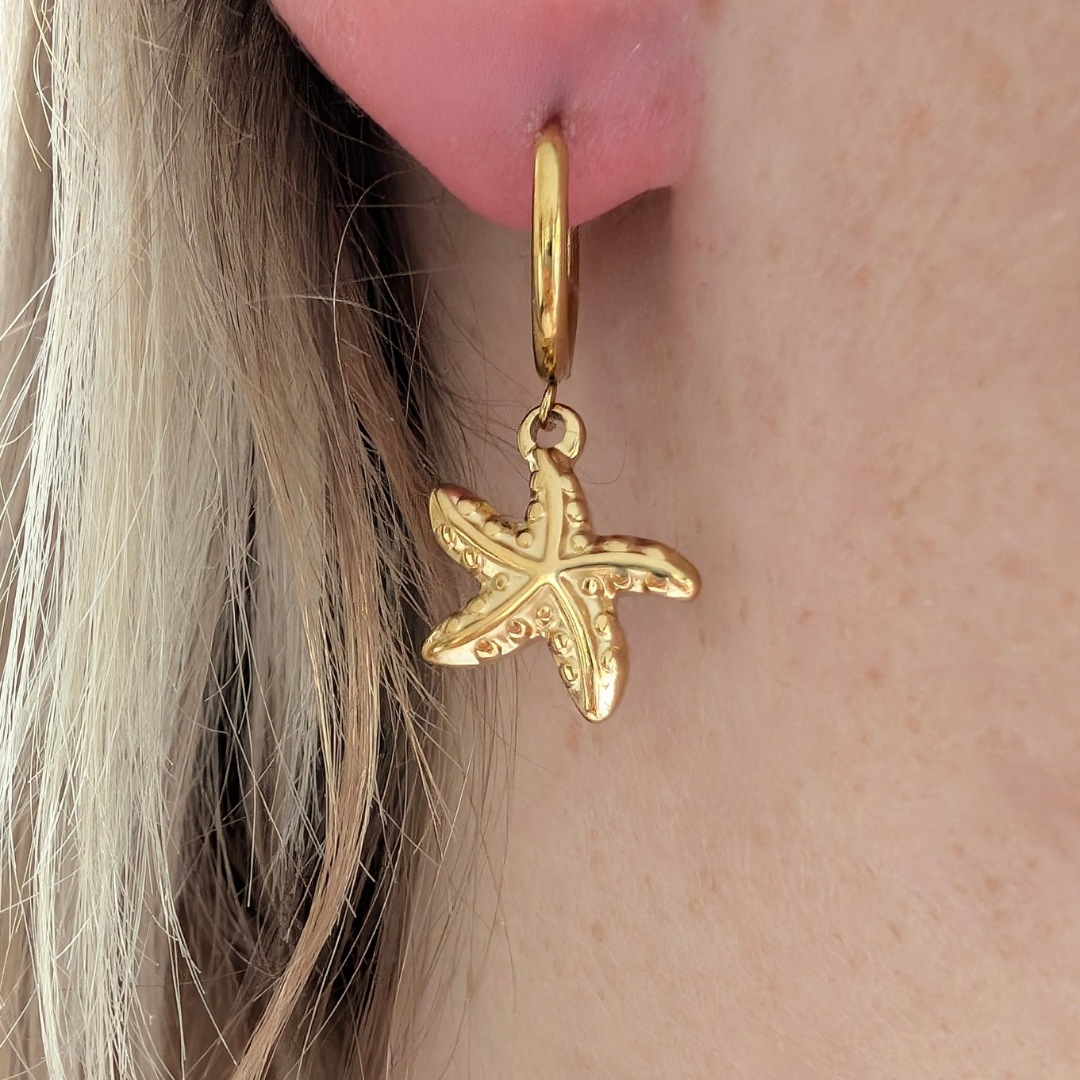 Gouden oorringetjes met zeester
