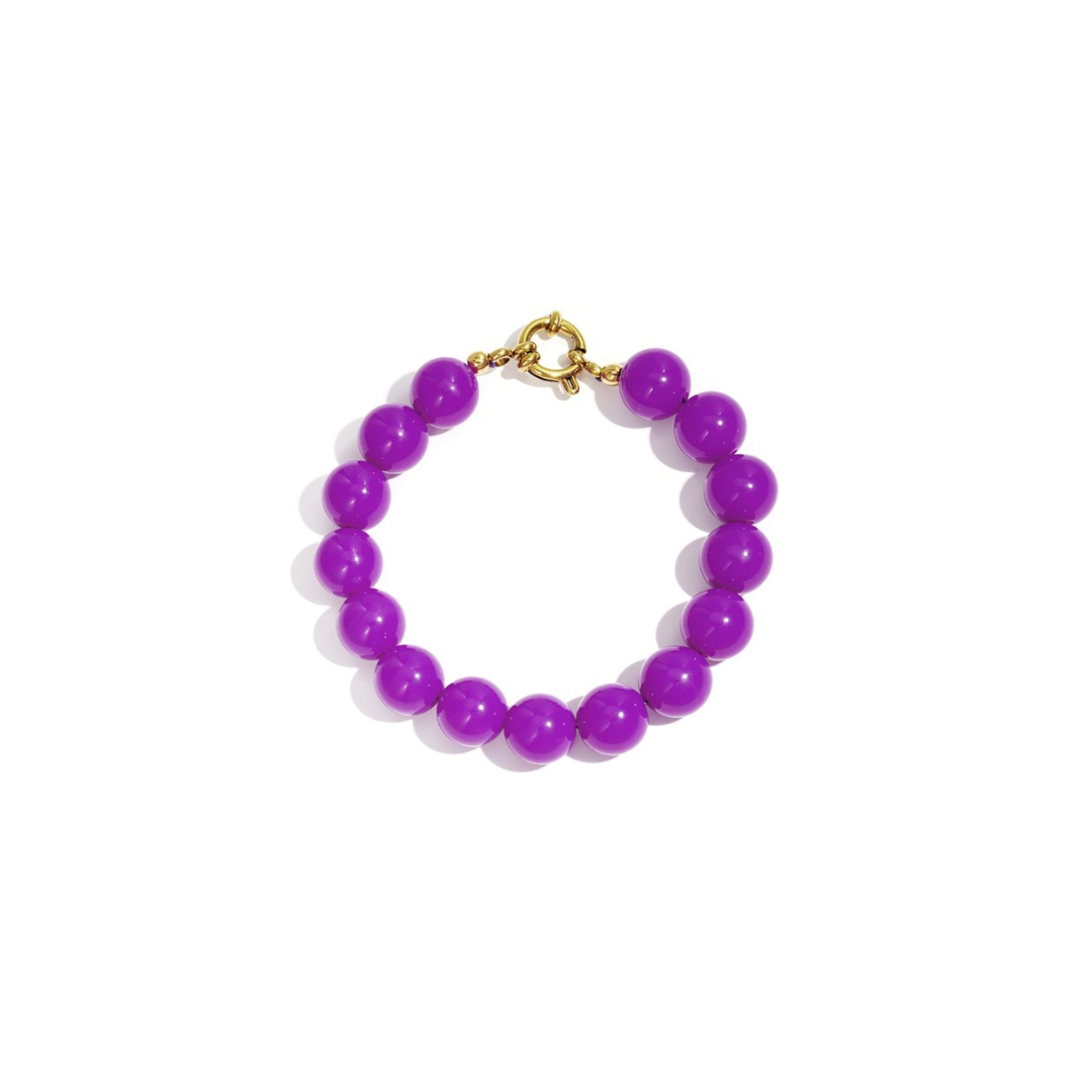 Paarse kralenarmband met goudkleurig boeislot in Ibiza style