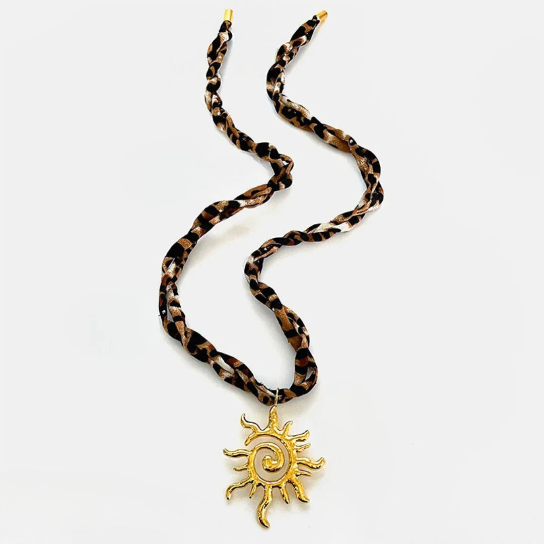 Ketting panterstof met gouden statement zon