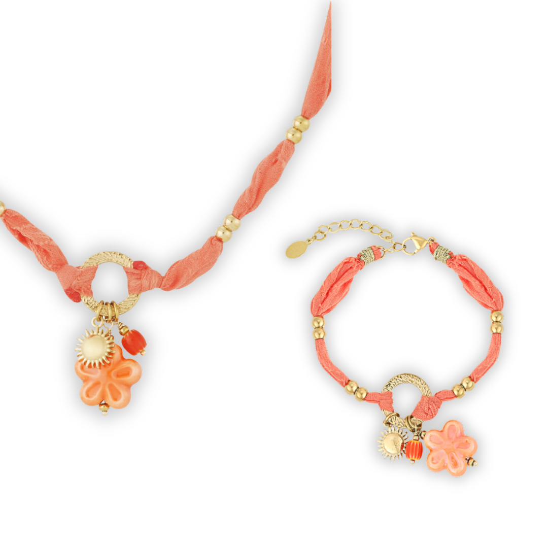 Setje oranje stof armband en ketting goud bloem zon en kraaltje