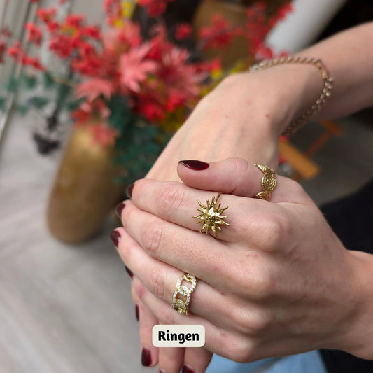 Ringen stapelen: gouden en zilveren ringen gecombineerd tot een stijlvolle ringstack