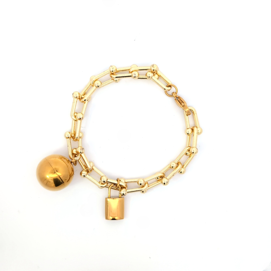 Gouden armband met bal en slotje