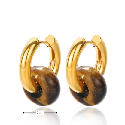 Gouden oorringen met bruin zwarte natuursteen donut