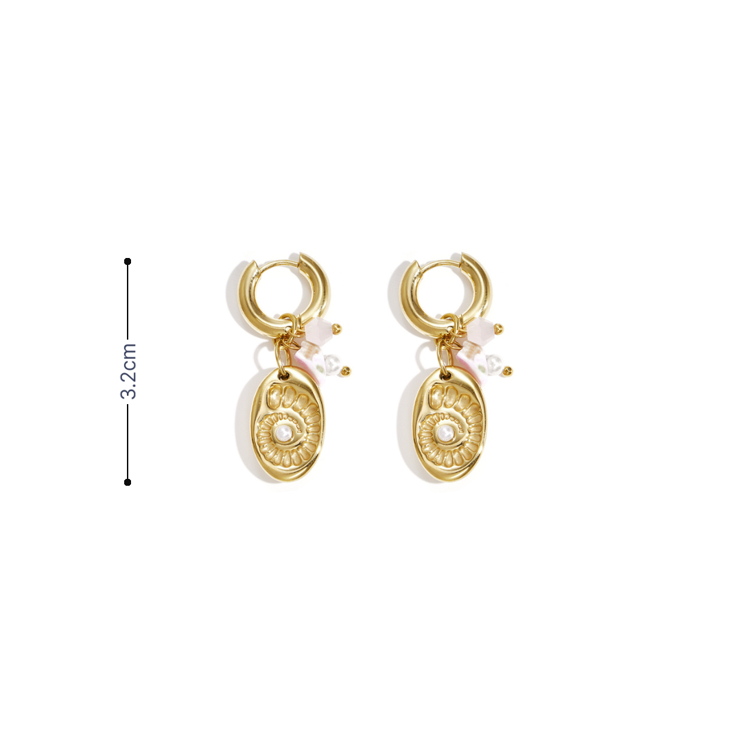 Gouden oorringetjes kraaltjes schelp fossiel