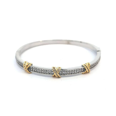 Bangle zilveren armband met goud kleurige kruisjes afgezet met strass