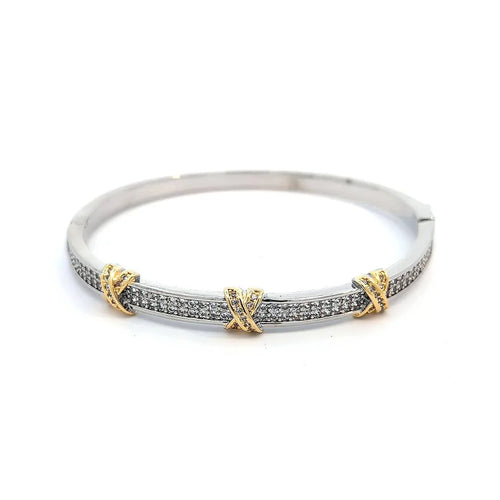 Bangle zilveren armband met goud kleurige kruisjes afgezet met strass