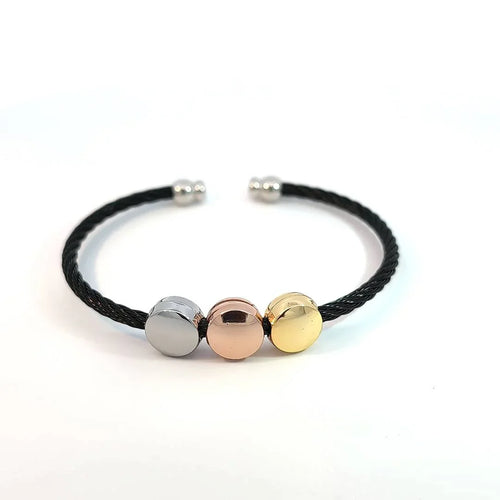 Bangle armband zwart gedraaide rvs draad met 3 gekleurde dots