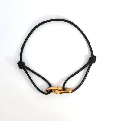 Zwart koord armbandje met gouden dubbele bedels