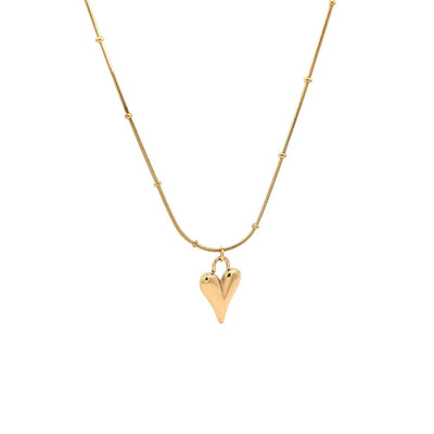 Gouden schakelketting balletjes hartjes bedel