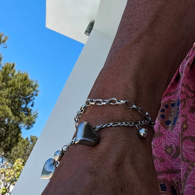 Dubbele zilveren schakel armband met hartjes en balletjes