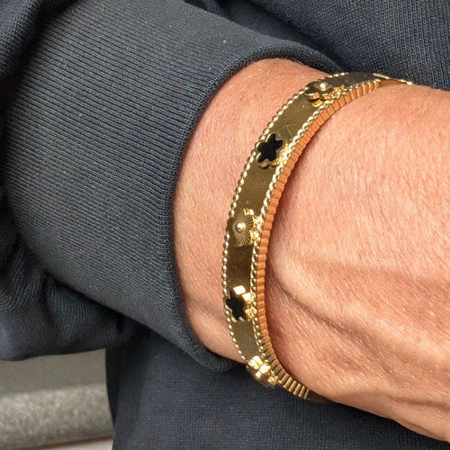 Bangle armband goud met bloemetjes zwart