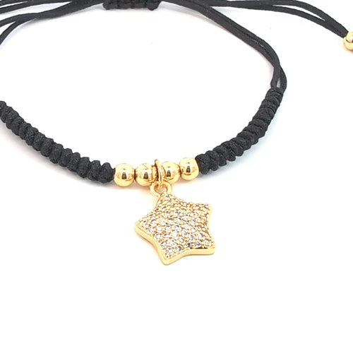 Verstelbare armband met gouden kraaltjes en ster met strass