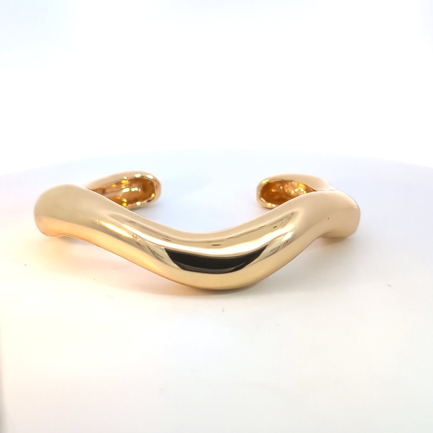 Open gouden bangle assymetrisch