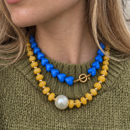 Blauwe hartjes kralenketting frontsluiting