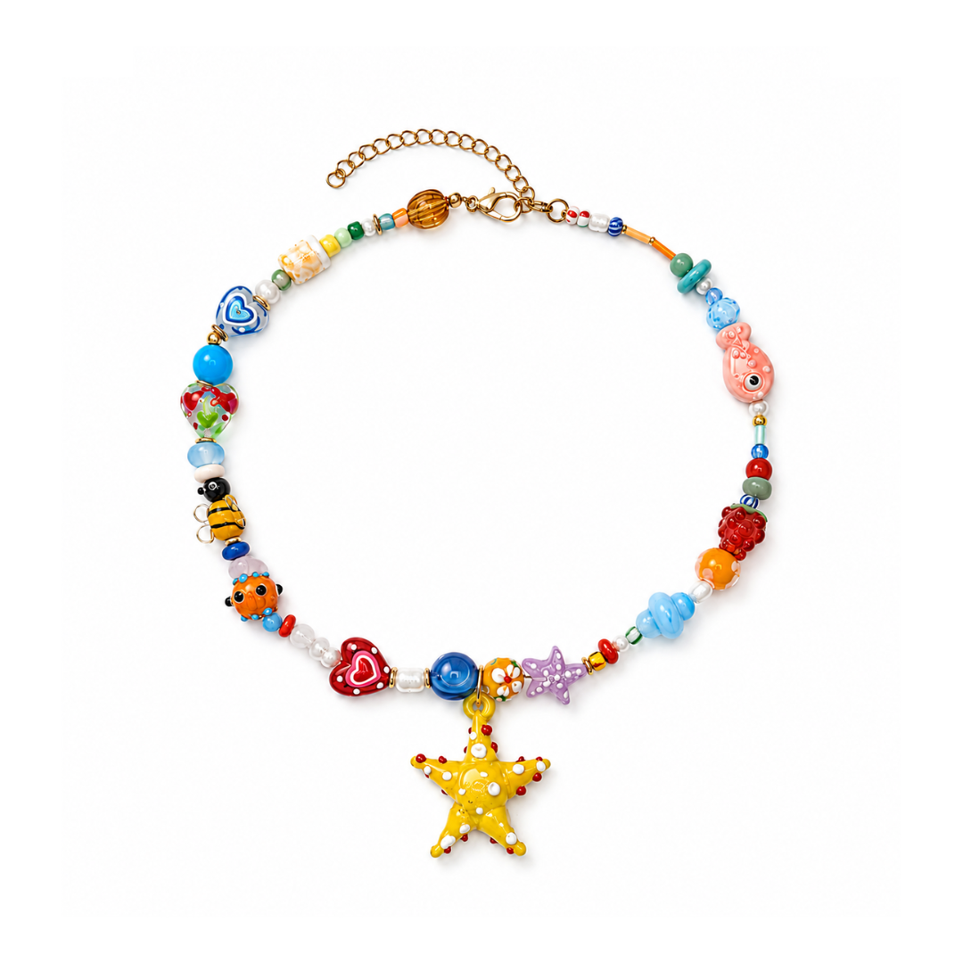Handgemaakte trinket glazen kralenketting met gele zeester bedel