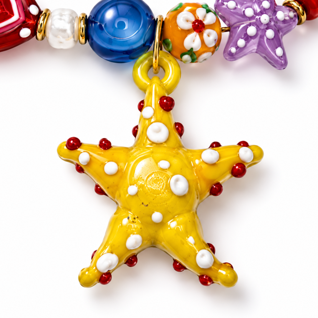 Handgemaakte trinket glazen kralenketting met gele zeester bedel