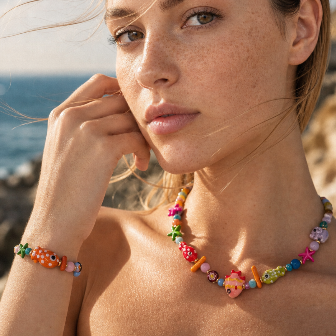 Trinket kralen armband met vissen en zeesterren
