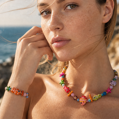 Trinket kralen armband met vissen en zeesterren