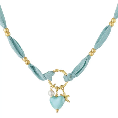 Licht blauwe ketting van stof met blauw hart gouden zeester en parelkraaltje - Casa Jadel