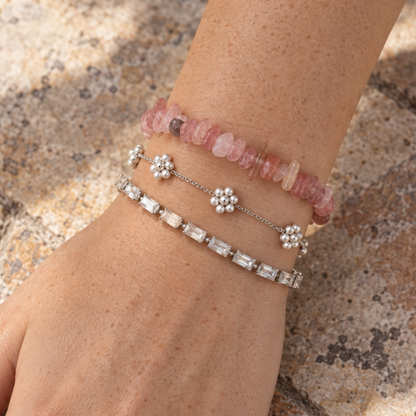 Zilveren schakelarmband met bloemen van parels