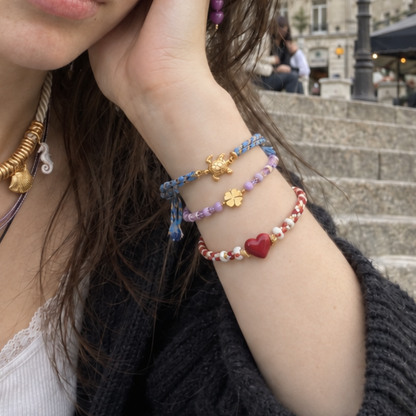 Blauwe rope armband met gouden schildpad